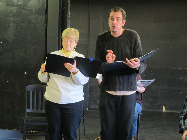 Mary the landlady (Martha Boswell) and Grinchley. He's come to inquire about her lodger, Professor Klaus.