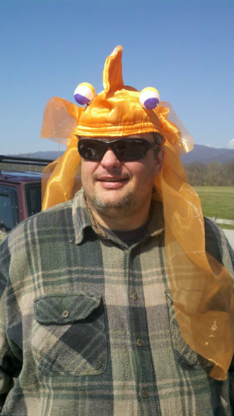 Chad Snyder tries on the headpiece, now with the eyes.