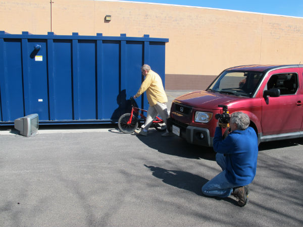 Charlie Boswell tries to get rid of the bike.