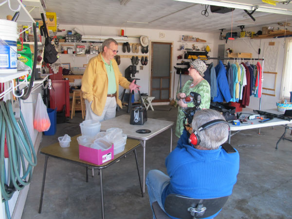 Nancy Lawrence buys a toaster from Charlie Boswell. Hank sits down on the job.