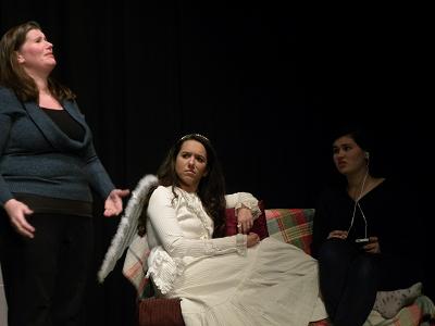 The angel decides to sit a spell. Molly, played by Kelly Weiman, doesn't see her, much to her mom's consternation.