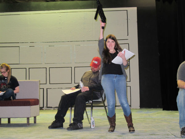 Emma Sala, as Meredith, gets everyone's attention. Well, except maybe her father, who's passed out drunk (Zeke, played by Tim Kennard.