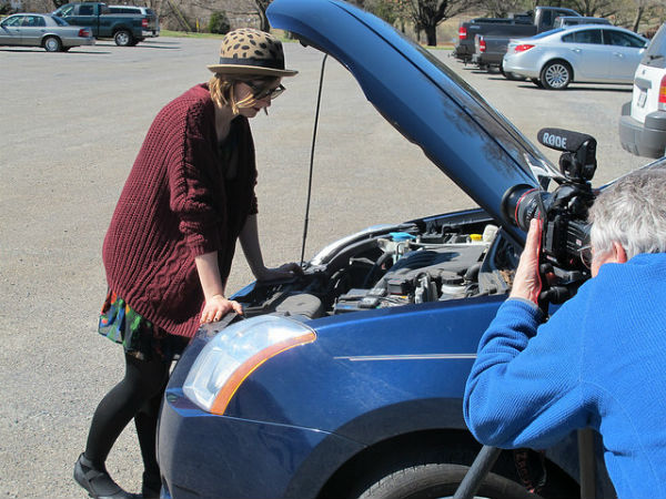 Uh-oh. Hannah Whitt has car trouble! Enough to distract even a bike thief.