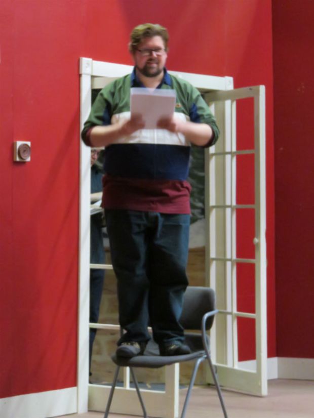 Instead it's just Zeke (Tim Kennard) up on the roof, tied up in Christmas lights. It's April, we might add, but he's trying to get a head start on winning the town's contest for the best Christmas lights.