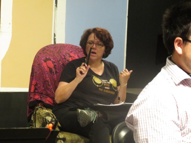 Yes, the fortune teller is armed.