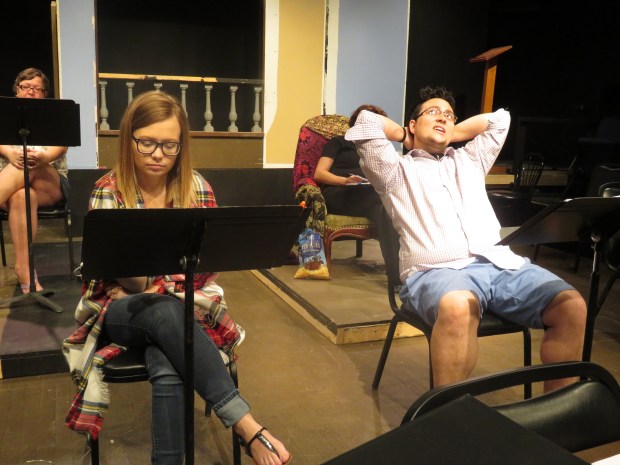 A rehearsal photo in civilian garb. Sara and Charlie wait out a tornado in the storm cellar. He's quite relaxed.