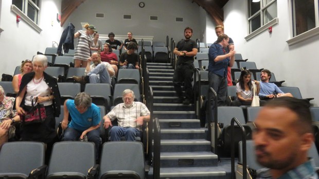 Here's some of the audience taking seats. This was in the theatre at Randolph College.