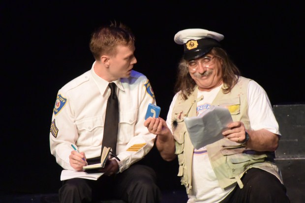 The officer with the interpreter who plays Captain Ahab.