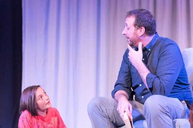 A father tries to tell a fairy tale to his daughter. She disputes the premise.