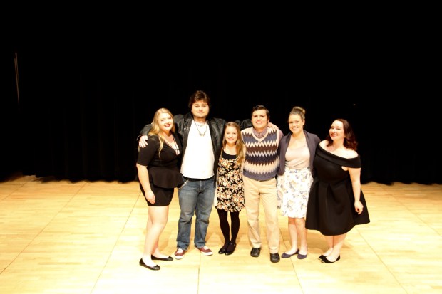 The cast with the two directors.